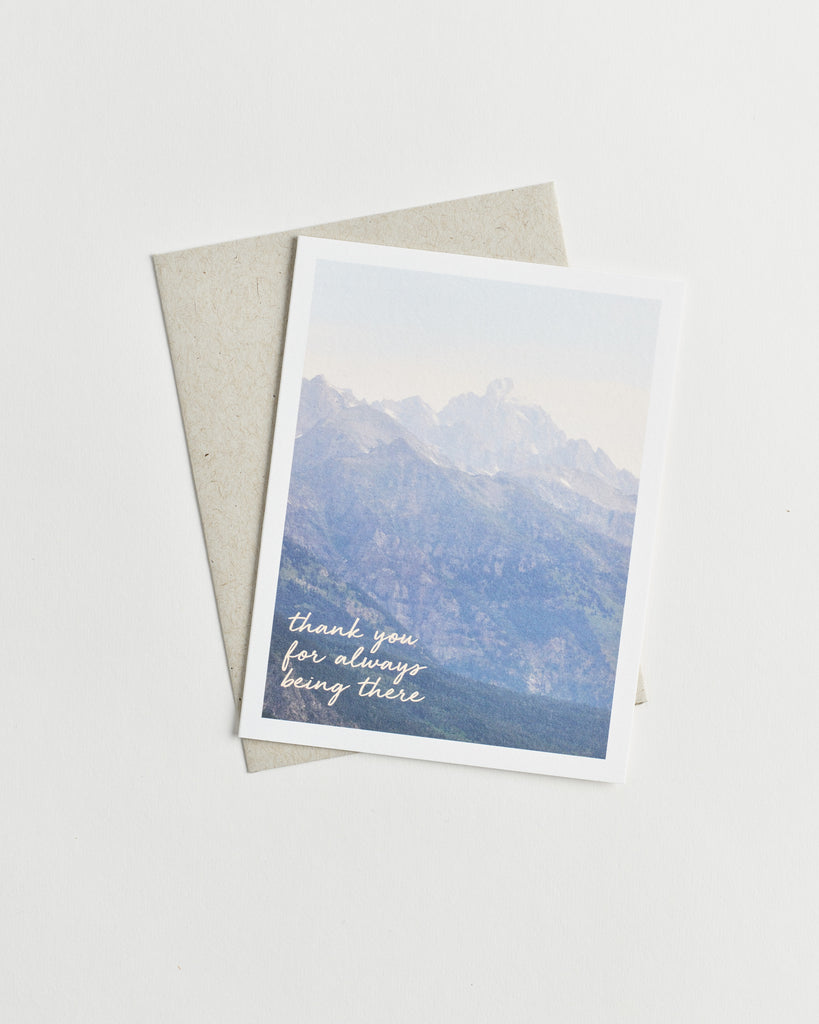  Photo greeting card of misty mountains and words “thank you for always being there” in cursive.