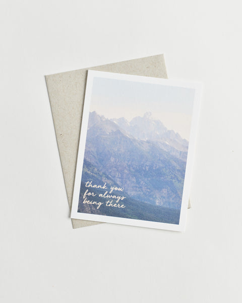 Photo greeting card of misty mountains and words “thank you for always being there” in cursive.