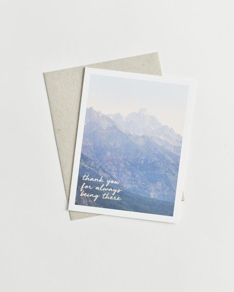  Photo greeting card of misty mountains and words “thank you for always being there” in cursive.