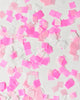 Knot and Bow pink mix square confetti scattered over a white background.