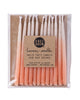 Package of 12 hand-dipped peach color beeswax birthday candles with ombré effect