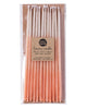 Package of 12 tall hand-dipped peach color beeswax birthday candles with ombré effect