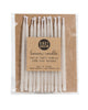 Package of 12 tall hand-dipped beeswax birthday candles in ivory white.