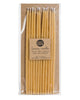 Package of 12 tall hand-dipped beeswax birthday candles in a natural pale yellow color.