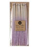 Package of 12 tall hand-dipped violet color beeswax birthday candles with ombré effect