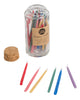 Hand-dipped beeswax candles in assorted rainbow colors, packaged in a glass jar with a cork top.