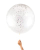 Clear jumbo balloon filled with a mix of white and iridescent confetti.