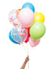 Bunch of party balloons in a mix of rainbow colors and clear balloons filled with assorted confetti