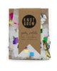 Single serving size of party confetti in a mix of white and rainbow metallic colors in different shapes.