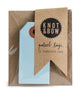 Package of 10 paper parcel gift tags in light blue