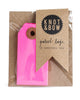 Package of 10 paper parcel gift tags in neon pink