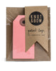 Package of 10 paper parcel gift tags in pink