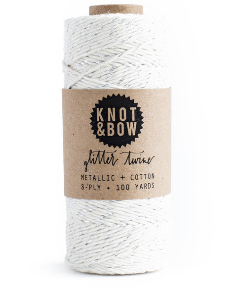 Spool of 100 yards of the original glitter twine in natural cotton with a twist of metallic silver