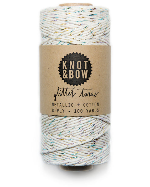 Spool of 100 yards of the original glitter twine in natural cotton with a twist of metallic rainbow prism